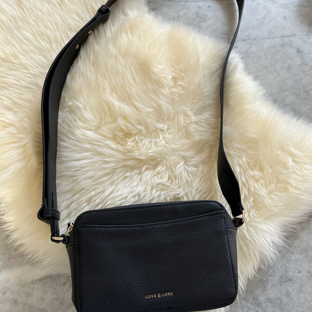 Black camera crossbody bag